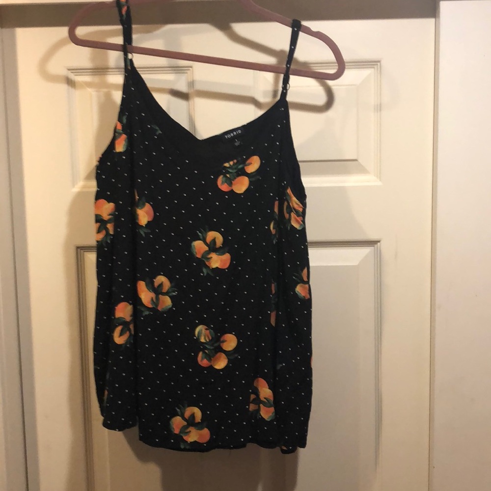 Peach designed blouse from Torrid 1x.